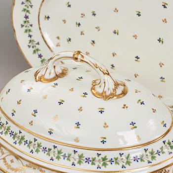 A French dinner service, circa 1800, some pieces marked M F Guerhard & Dahl.  (70 pieces).