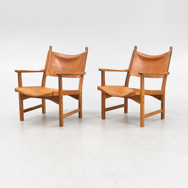Carl Malmström & Yngve Ekström, a pair of 'Caryngo' oak armchairs, Swedese, second half of the 20th century.