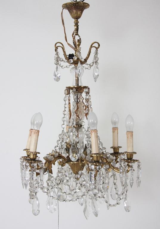 LJUSKRONA, nyrokokostil. H 74.
Proveniens: Git Gay.