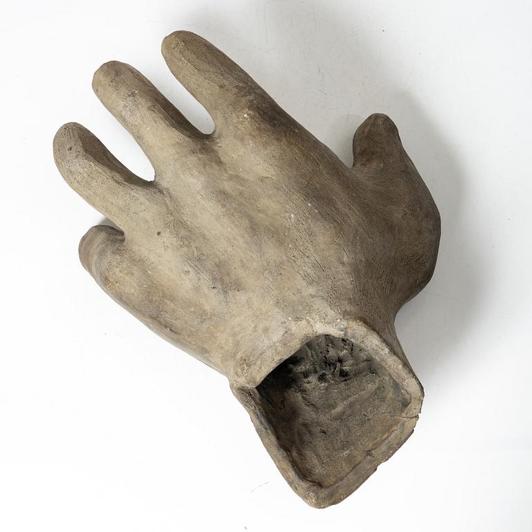 Allan Ebeling, a ceramic sculpture of a hand.