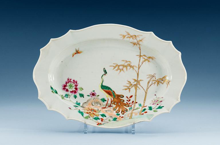 A famille rose 'peacock' serving dish, Qing dynasty, Qianlong (1736-95).