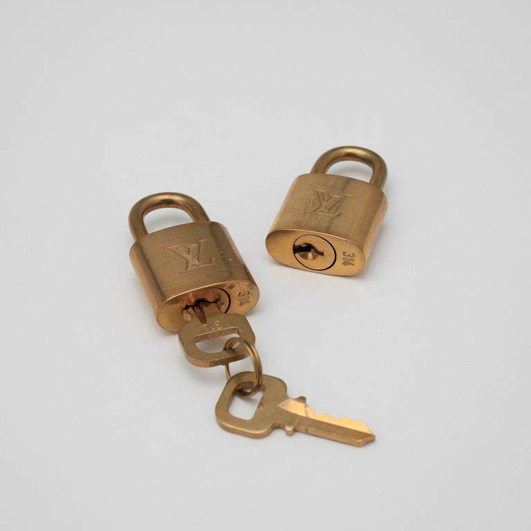 LOUIS VUITTON, a Monogram canvas "Alizé 24 heures" weekend bag.