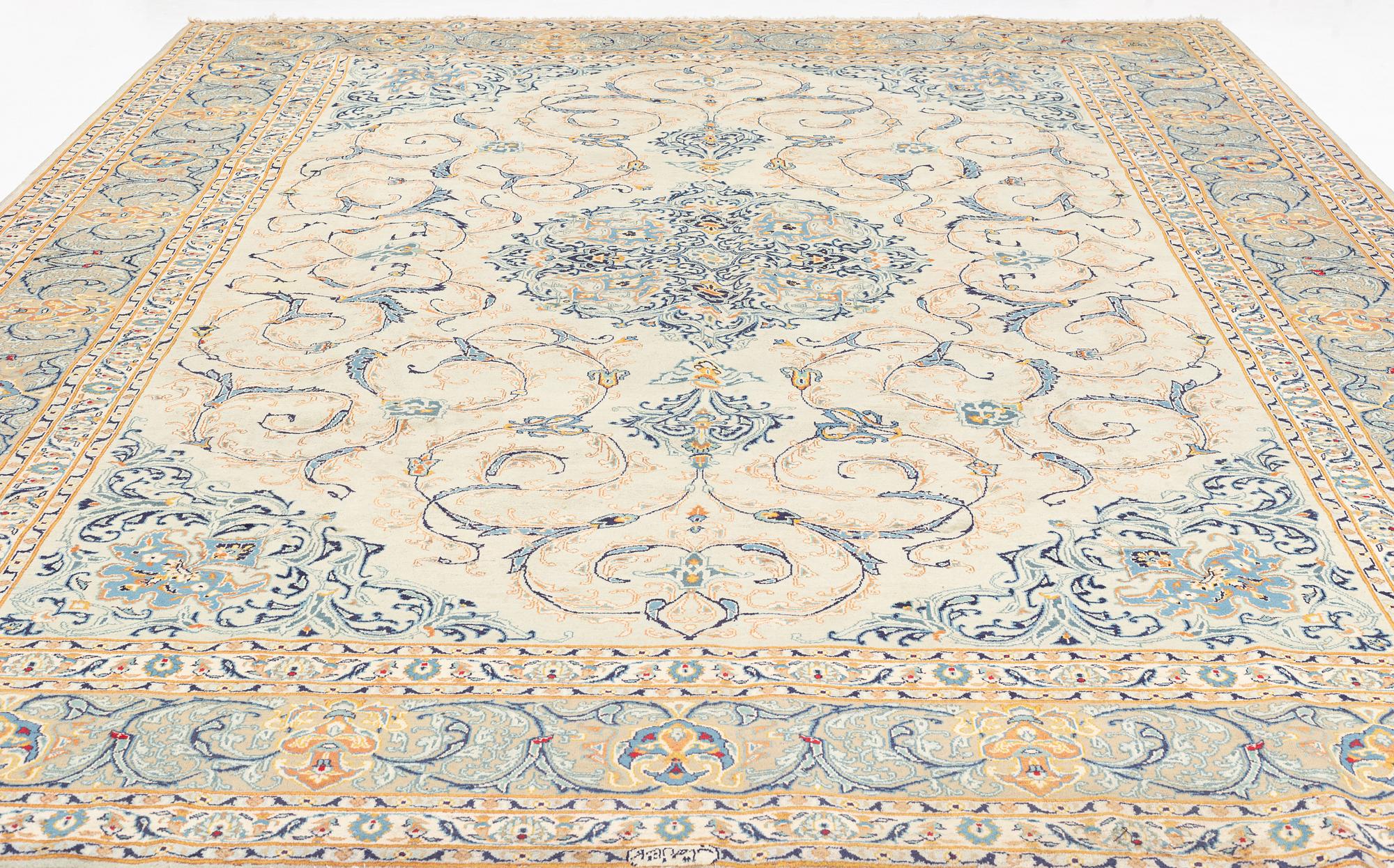 A signed Kashan, carpet ca 450 x 335 cm.