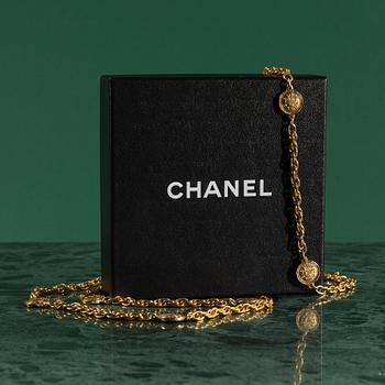 Necklace by Chanel.