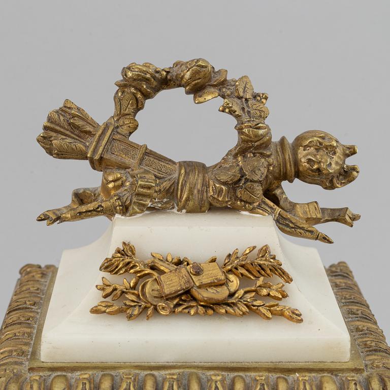 A circa 1900 Louis XVI-style mantle clock.