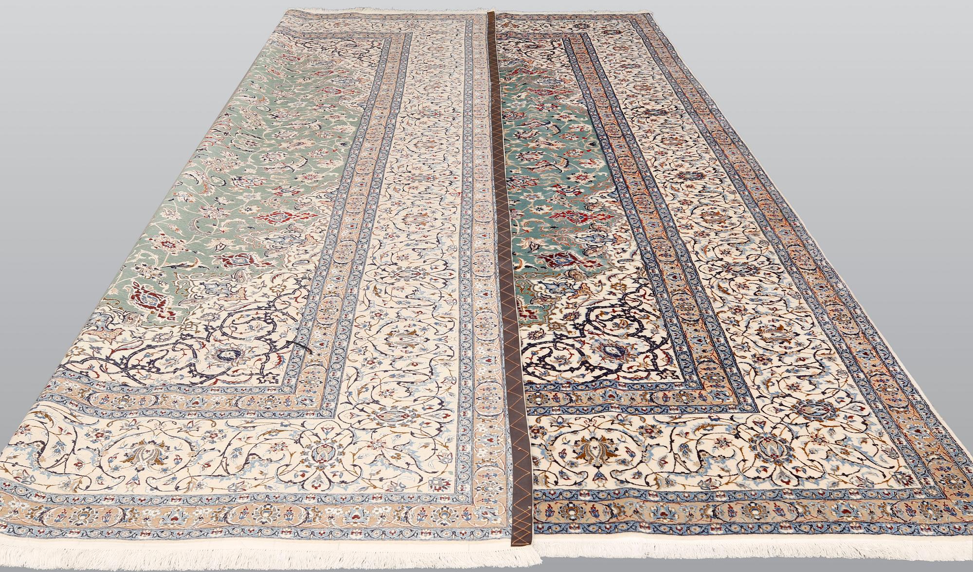 A part silk Nain carpet, so-called 6LAA, approx. 408 x 305 cm.