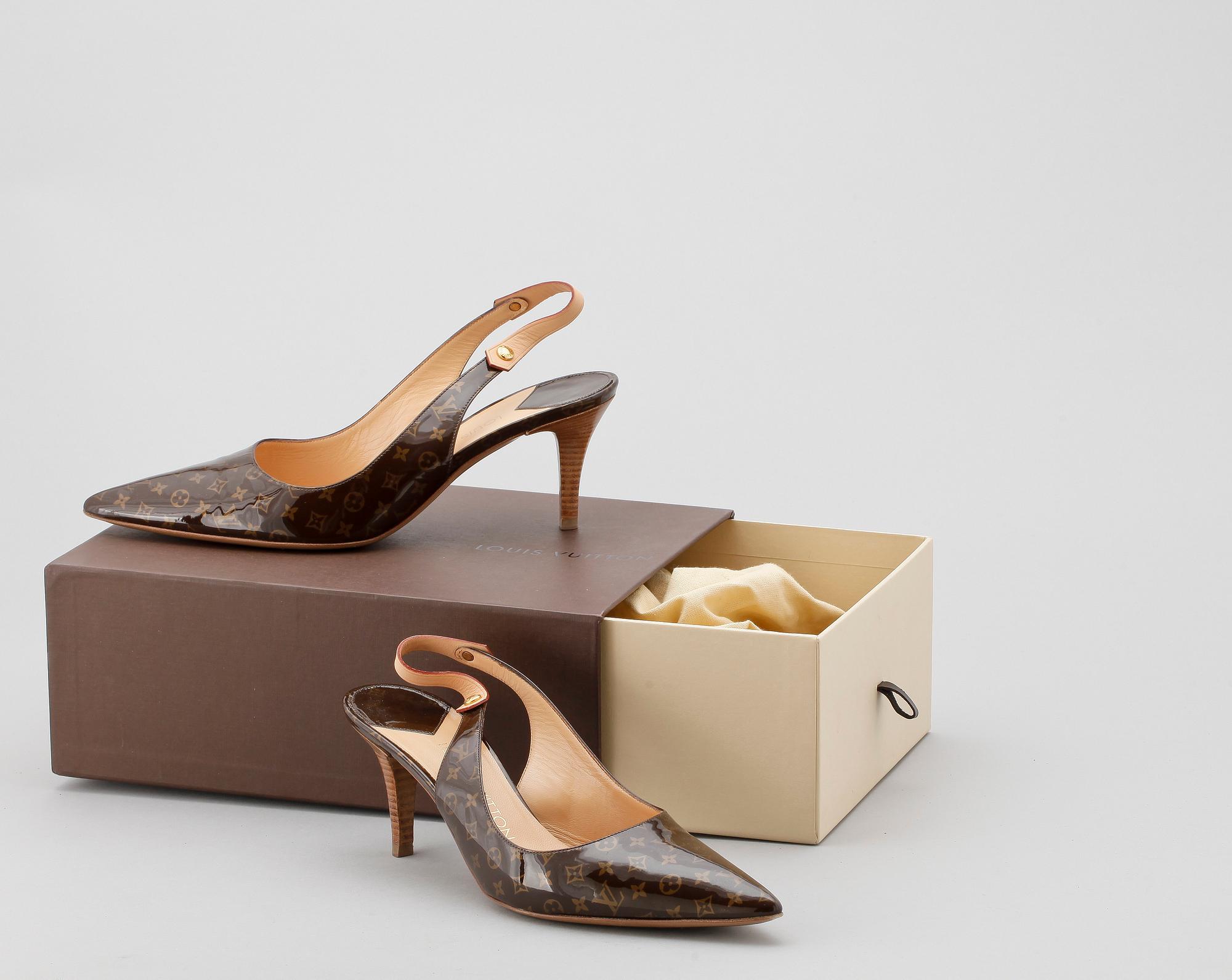 A pair of slingbacks by Louis Vuitton.