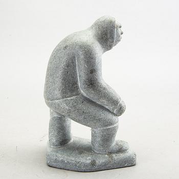 A simon Kristofferson signed stone figurine.