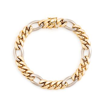 472. An 18K gold and white gold bracelet by Jan Hellströmer.