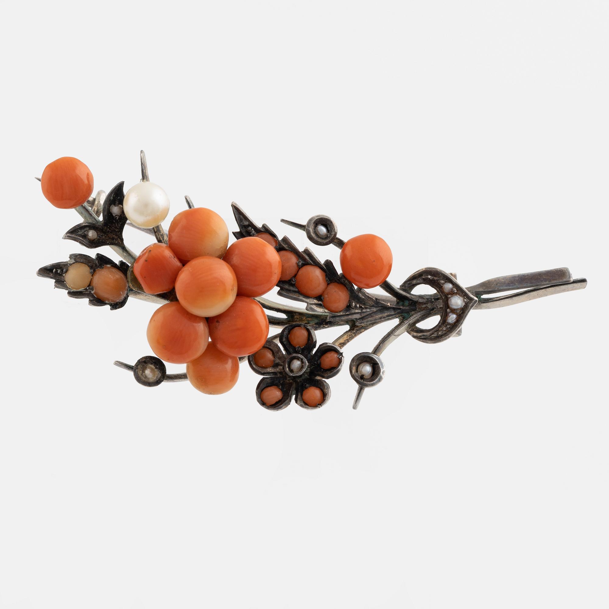 Silver and coral earrings and brooch.