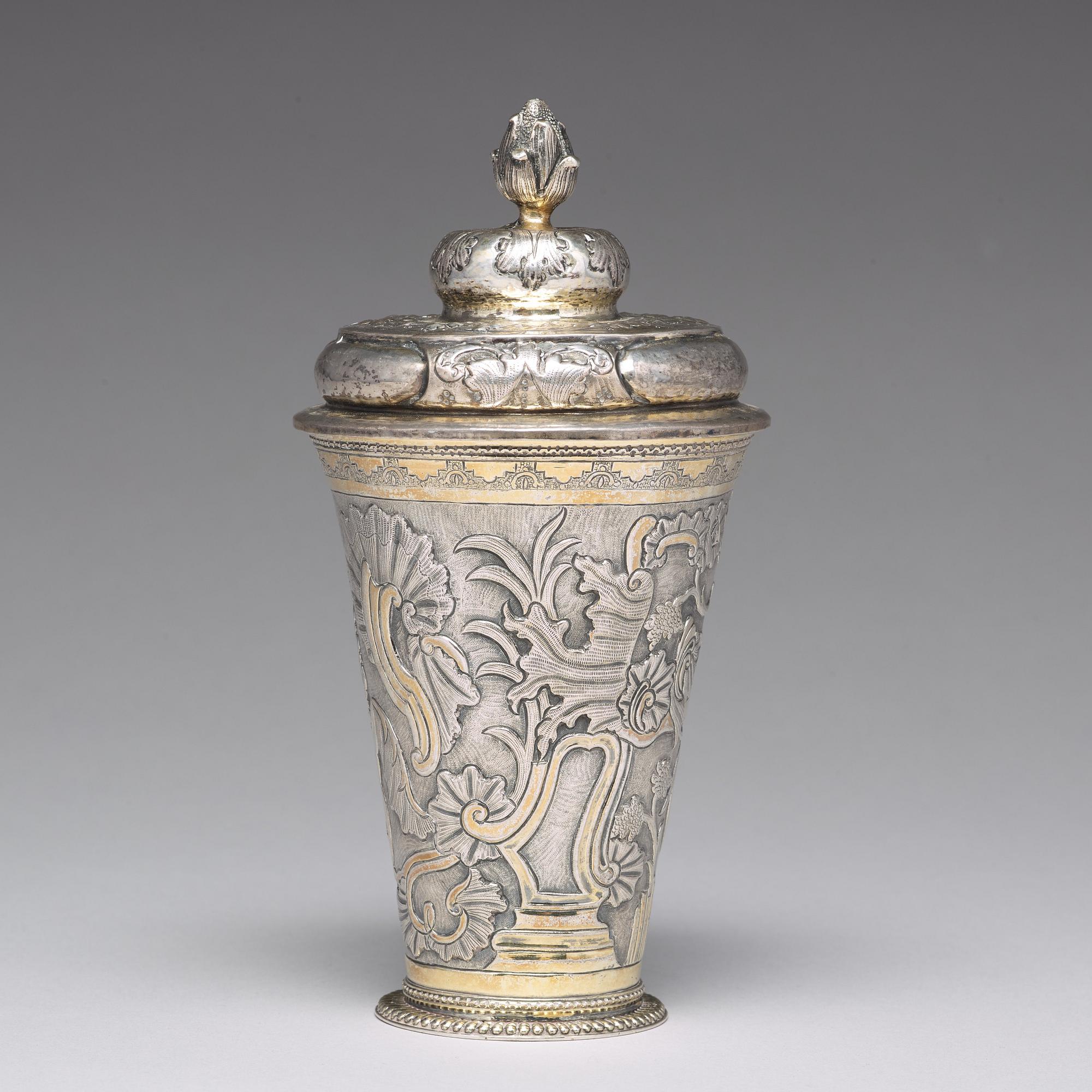 A Russian 18th century parcel-gilt silver beaker and cover, mark of Grigorij Poltow, Moscow (1755-1768).