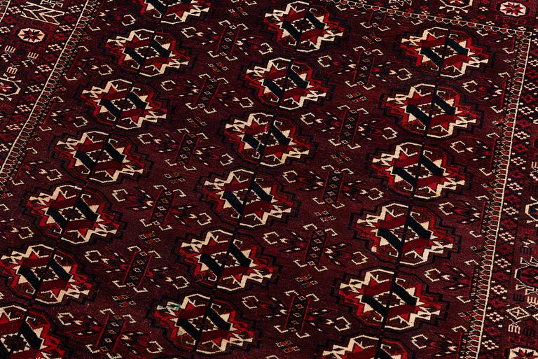 An antique Yomut rug, Western Turkmenistan, c. 119 x 104 cm.