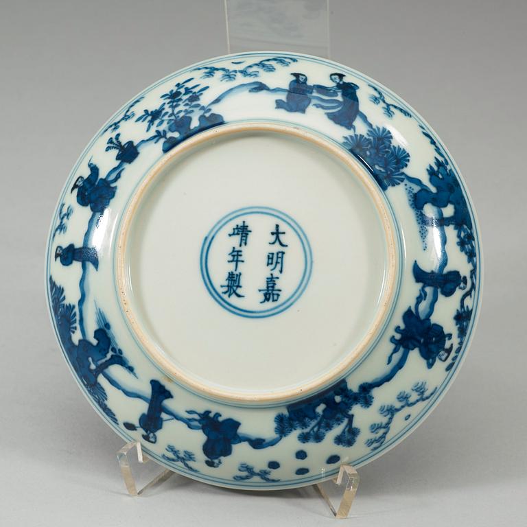 A blue and white dish, Ming Dynasty, with Jiajing six
character mark an of the period.