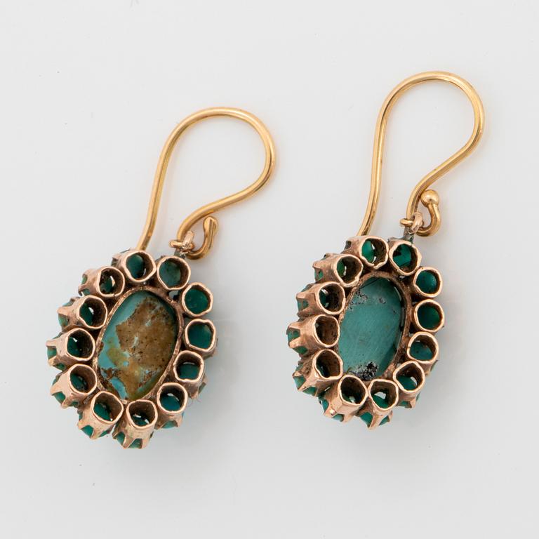 A pair of 18K and 9K gold earrings set with turquoises.