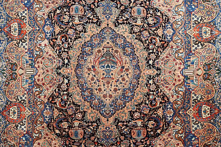 A Kashmar carpet, c. 392 x 296 cm.