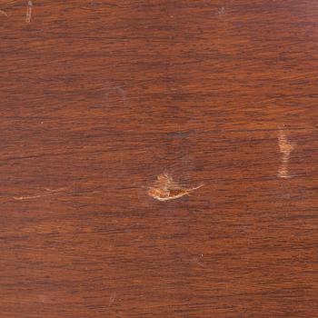 An easy chair and ottoman by Charles & Ray Eames, Herman Miller, USA, produced with licence by Hille, London.