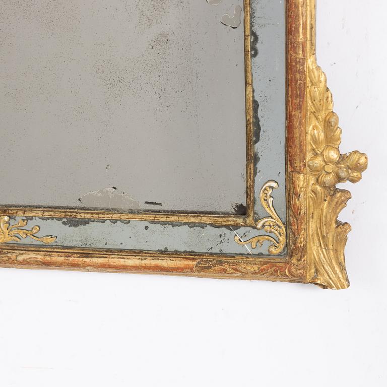 A rococo mirror, second part of the 18th Century.