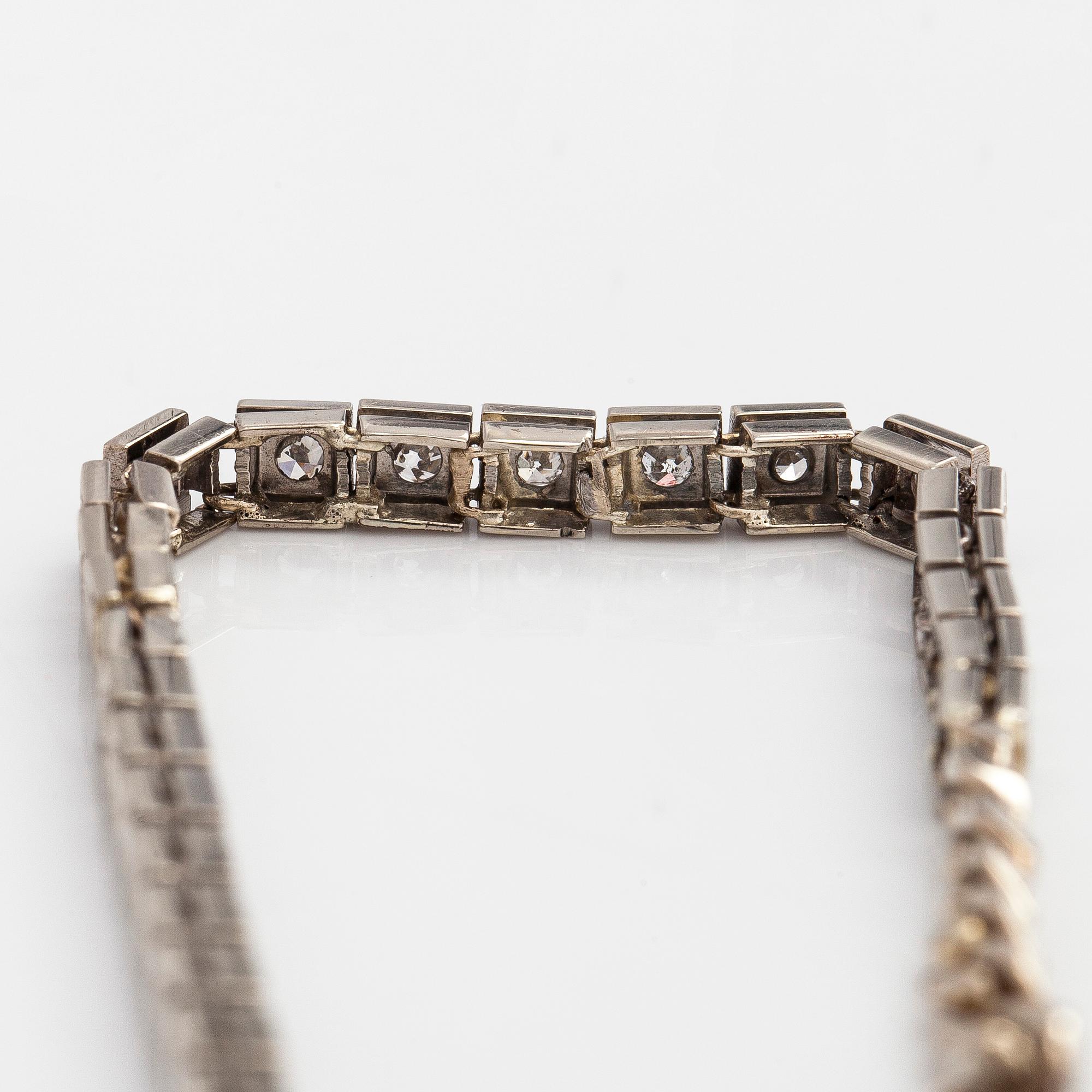 Rannekoru, 14K valkokultaa, 8/8 hiottuja timantteja.