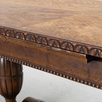 A dining table, 1920s.