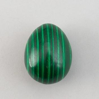 Six 20th century malachite balls and an egg.