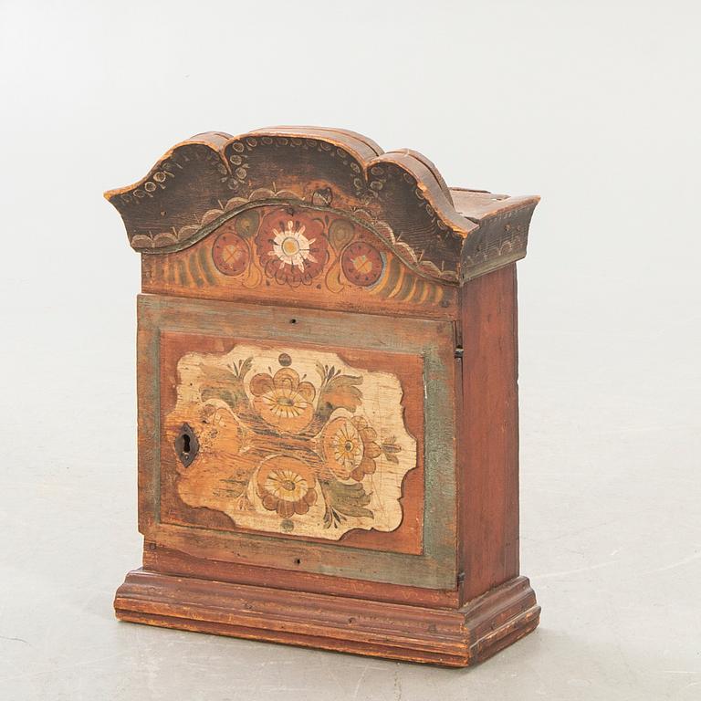 A Swedish painted wall cabinet by Mill Olof Olsson, Lima 19th century.