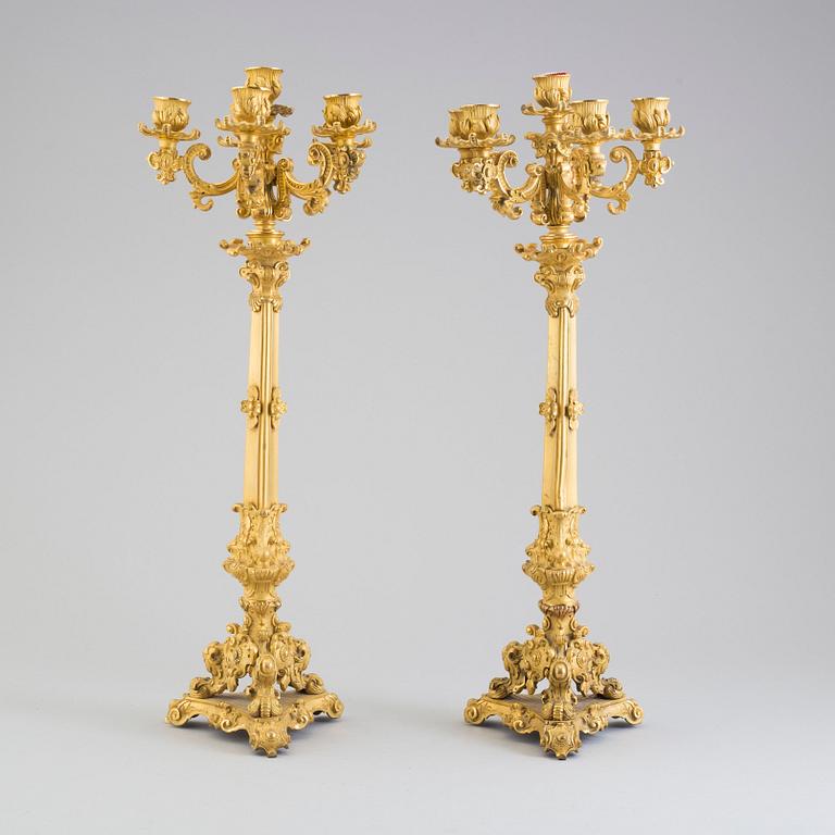 A pair of early 20th century bronze candelabras.