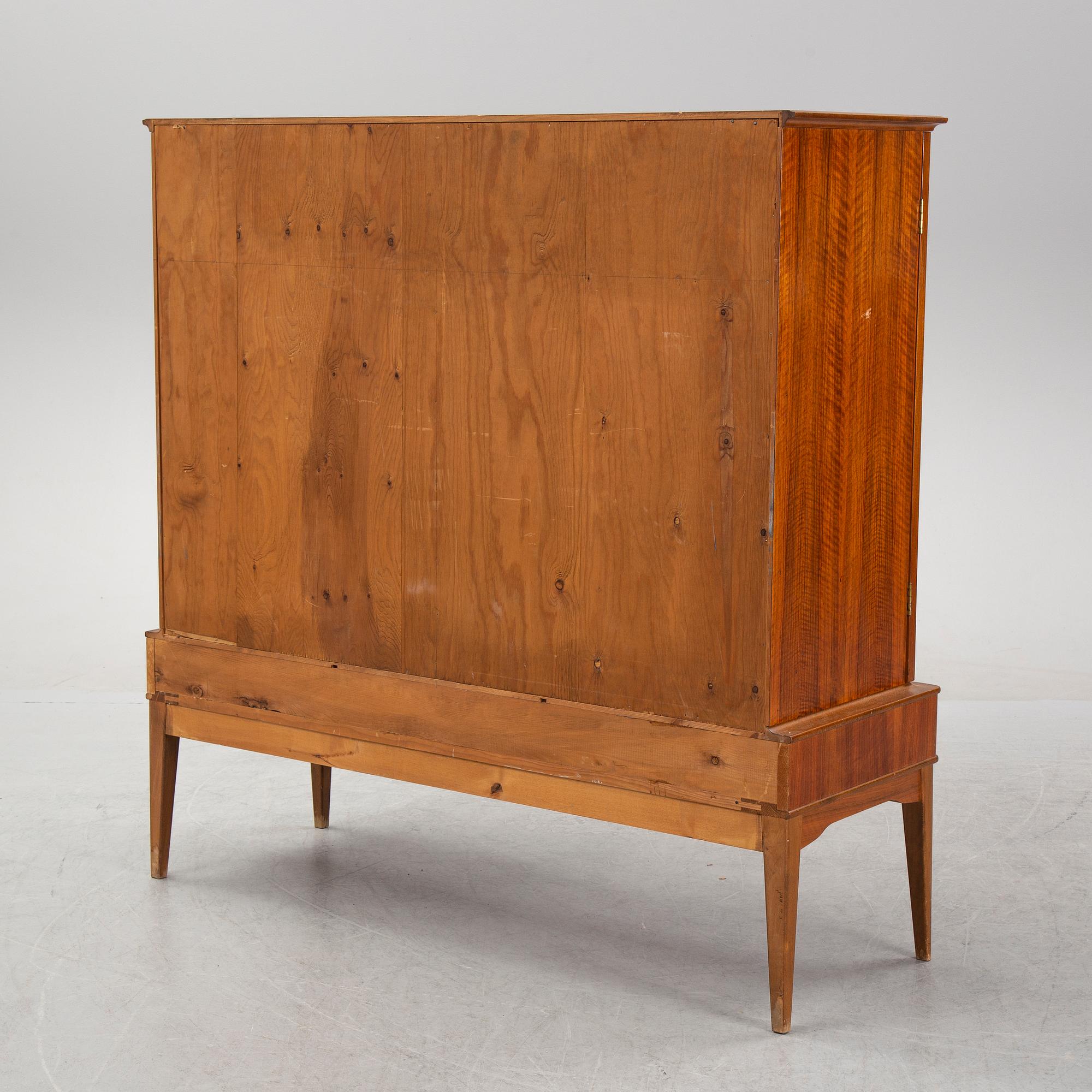 A walnut veneered cabinet, 1940's/50's.