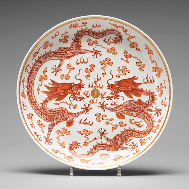 A iron red five clawed dragon dish, Qing dynasty, Guangxu mark and period (1875-1908).