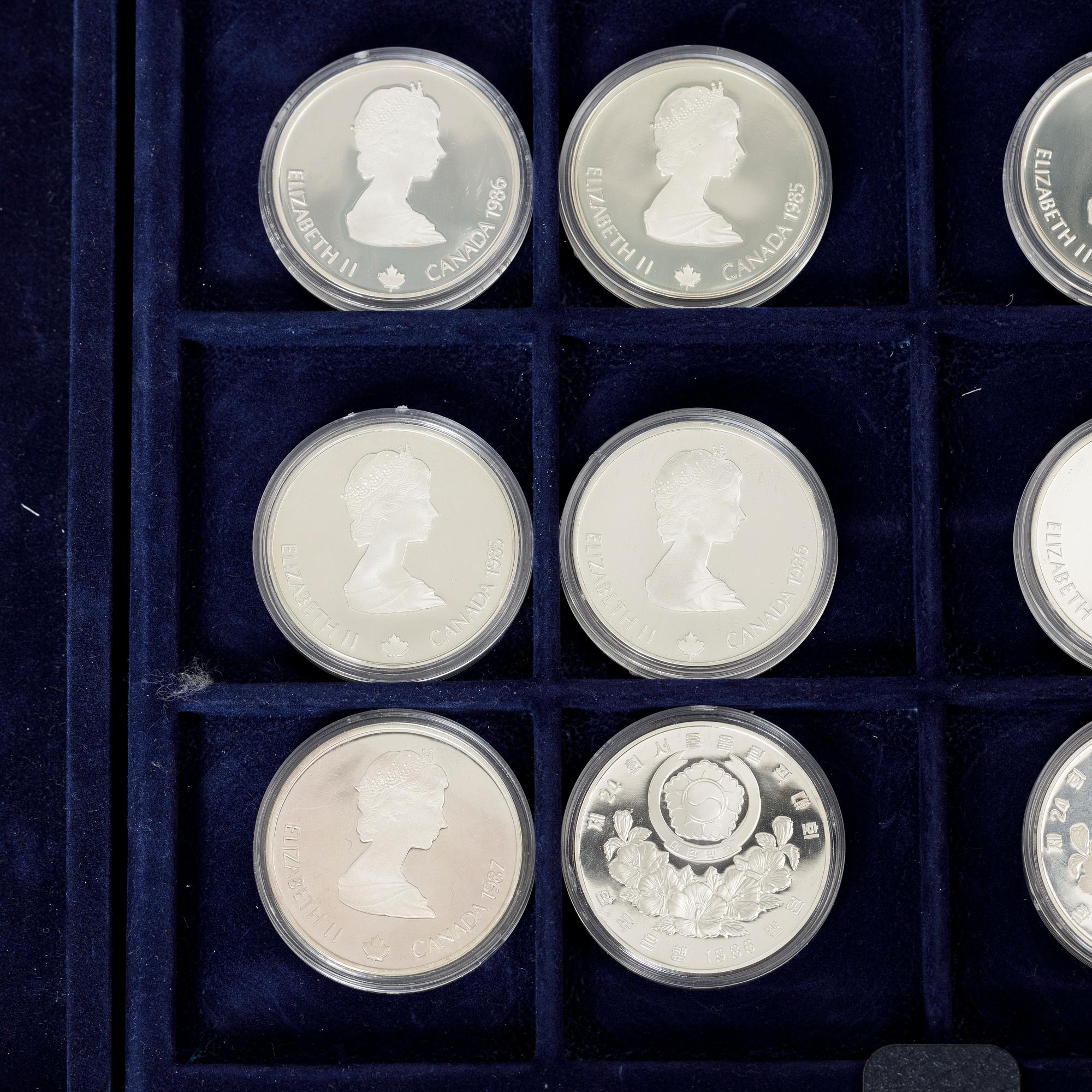 Twelve commemorative sterling silver coins, Olympic Games, Calgary and Seoul, 1988.