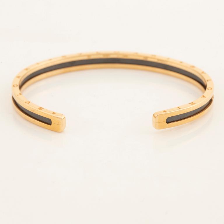 Bulgari, Ring and bangle B.zero1. 18K gold, steel and black ceramics.
