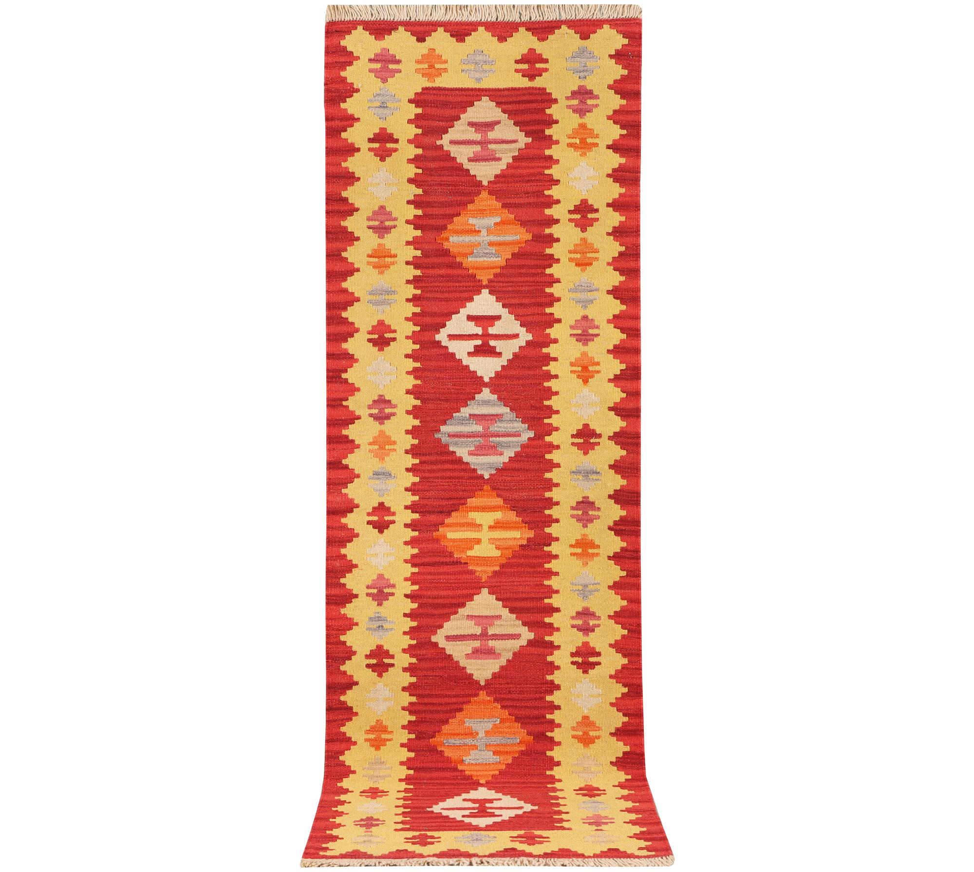 A Kilim runner carpet, c. 197 x 60 cm.
