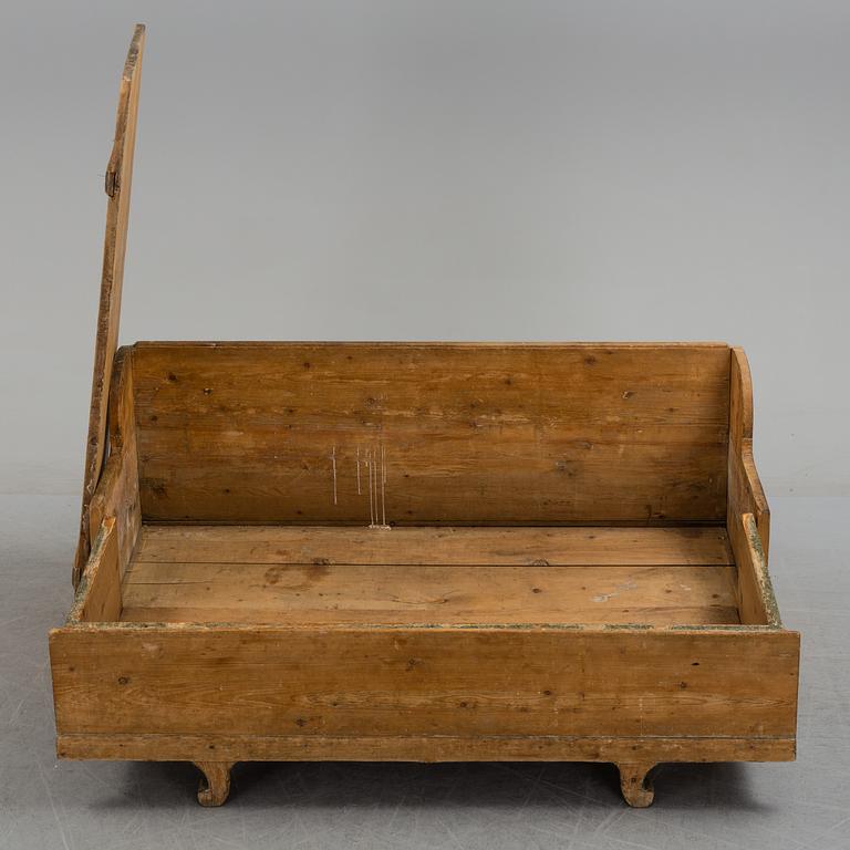 A pine sofa, 19th Century.