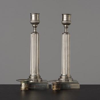 A pair of Gustavian white metal candlesticks by Isak Gråsten (1770-1821), Wedevågs Bruk.