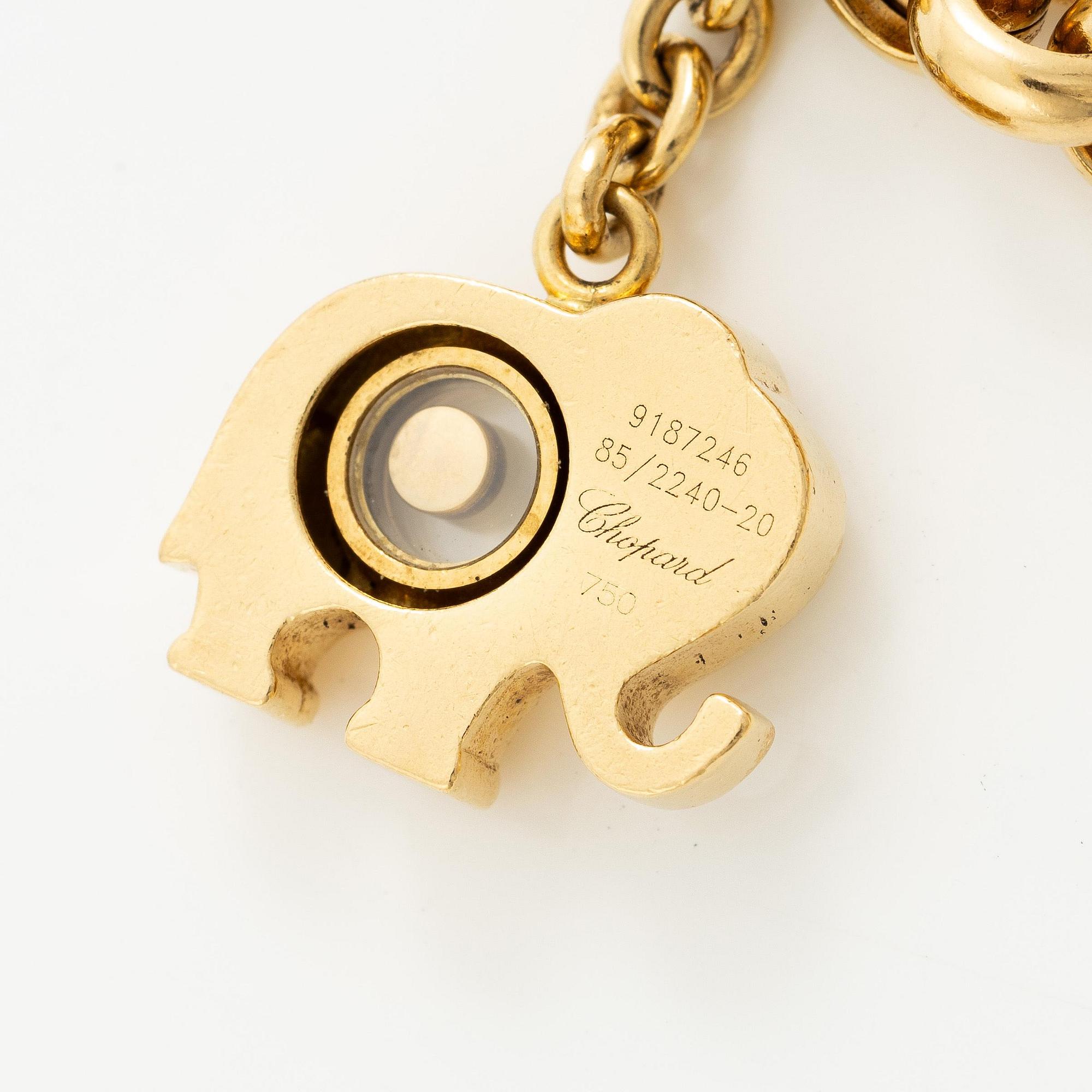 Chopard armband med berlocker 18K guld med runda briljantslipade diamanter.