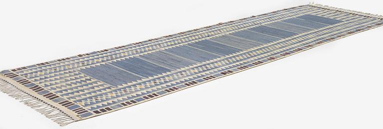 Barbro Nilsson, a runner, 'Salerno blå', flat weave, c. 419 x 122 cm, signed AB MMF.