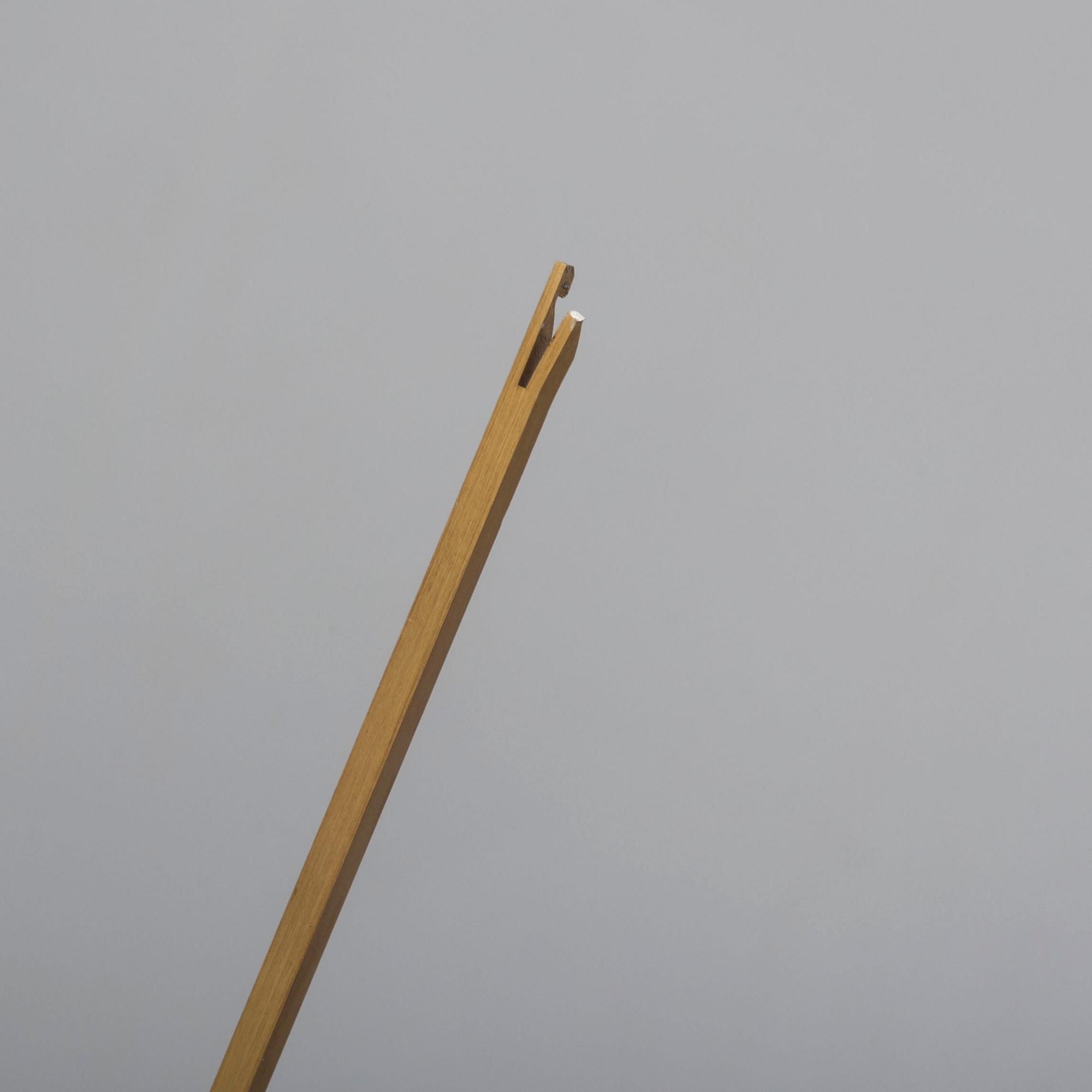 An oak veneered wall clock from the 1960s.