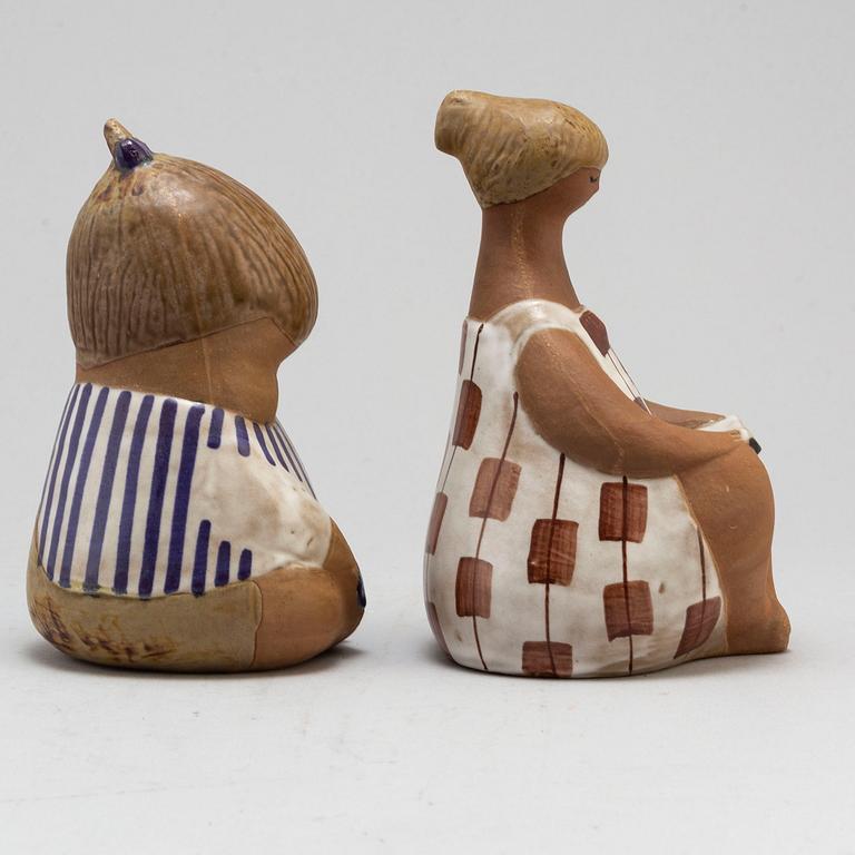 LISA LARSON, two signed stoneware figures.