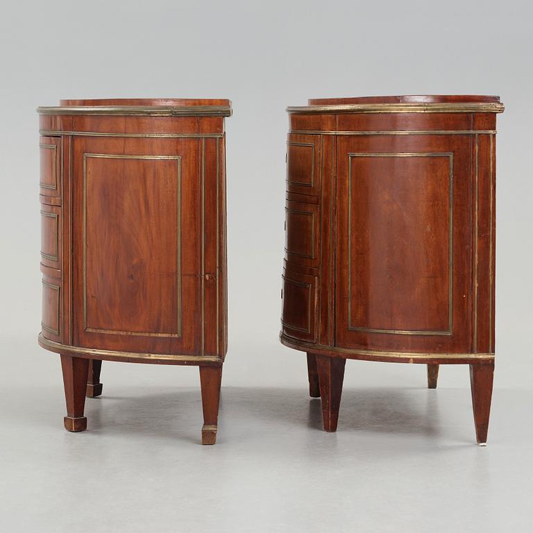 A matched pair of Russian Neoclassical Commodes, St Petersburg, circa 1800.