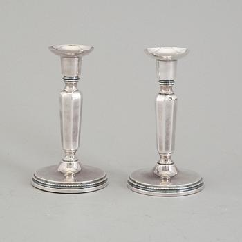 A pair of 1971 silver candelsticks by MGAB, Uppsala.