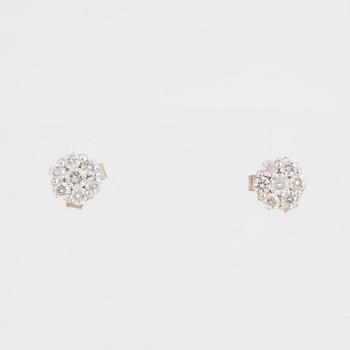 Brilliant-cut diamond earrings.