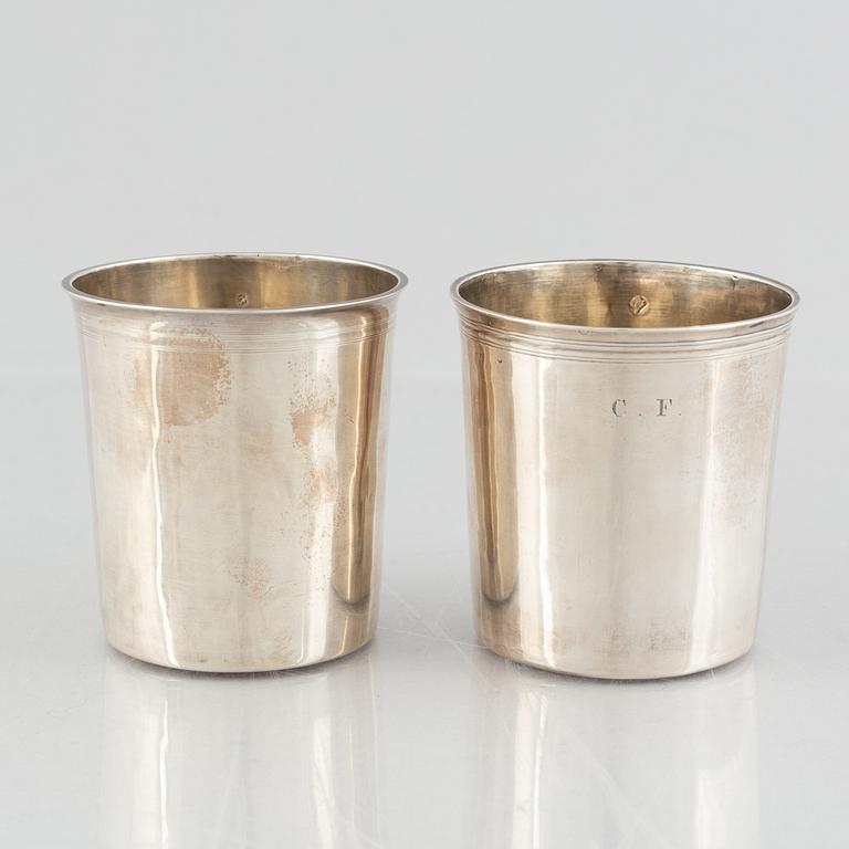 A set of four silver beakers, including Anders Rothman the Younger, Örebro, 1852-54.