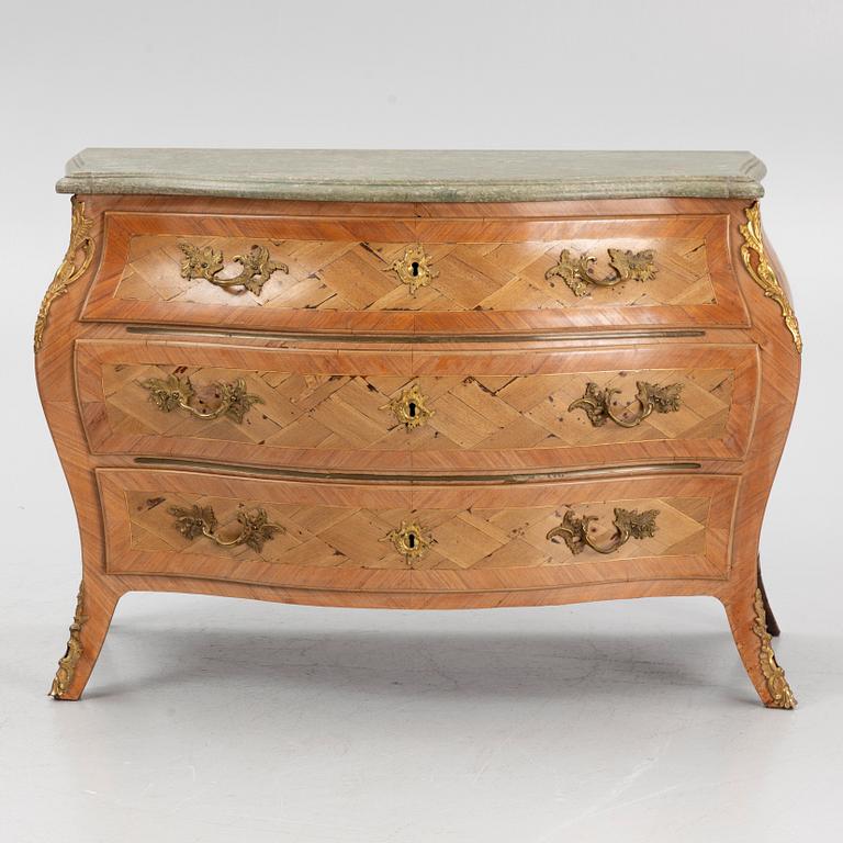 A Swedish rosewood parquetry and gilt brass-mounted rococo commode, Stockholm, later part 18th century.