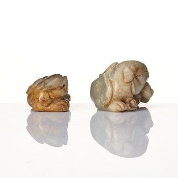 Two Chinese sculptures of buddhist lions.