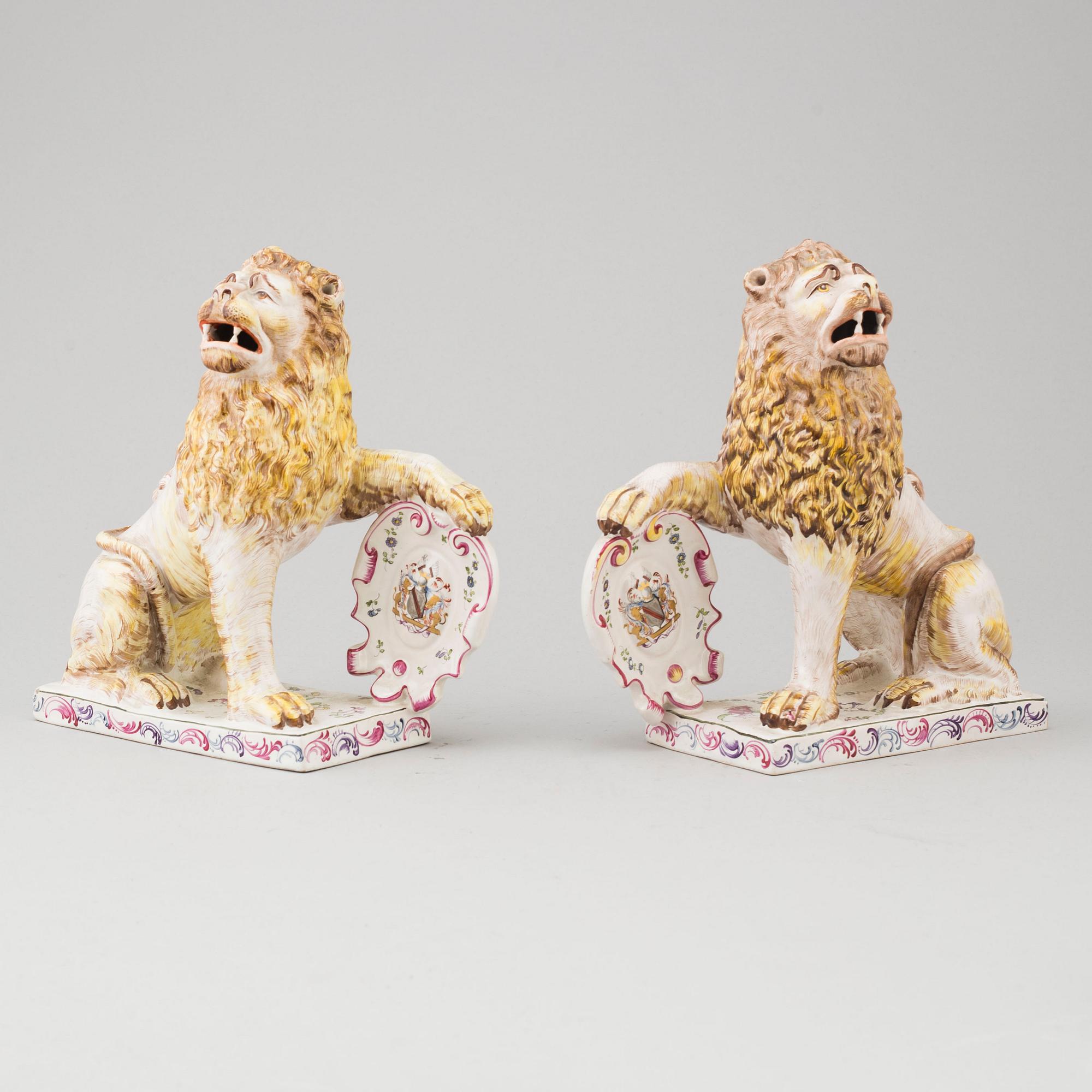 A PAIR OF FRENCH FAYENCE BOOK ENDS, 20th century.