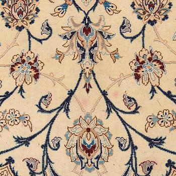 A carpet, Nain, part silk S.K 9LAA. Circa 352x248 cm.