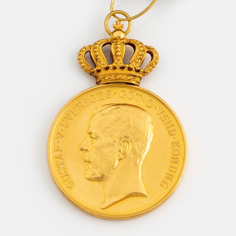 A Swedish Pro Patria gold medal for merit, with ribbon.