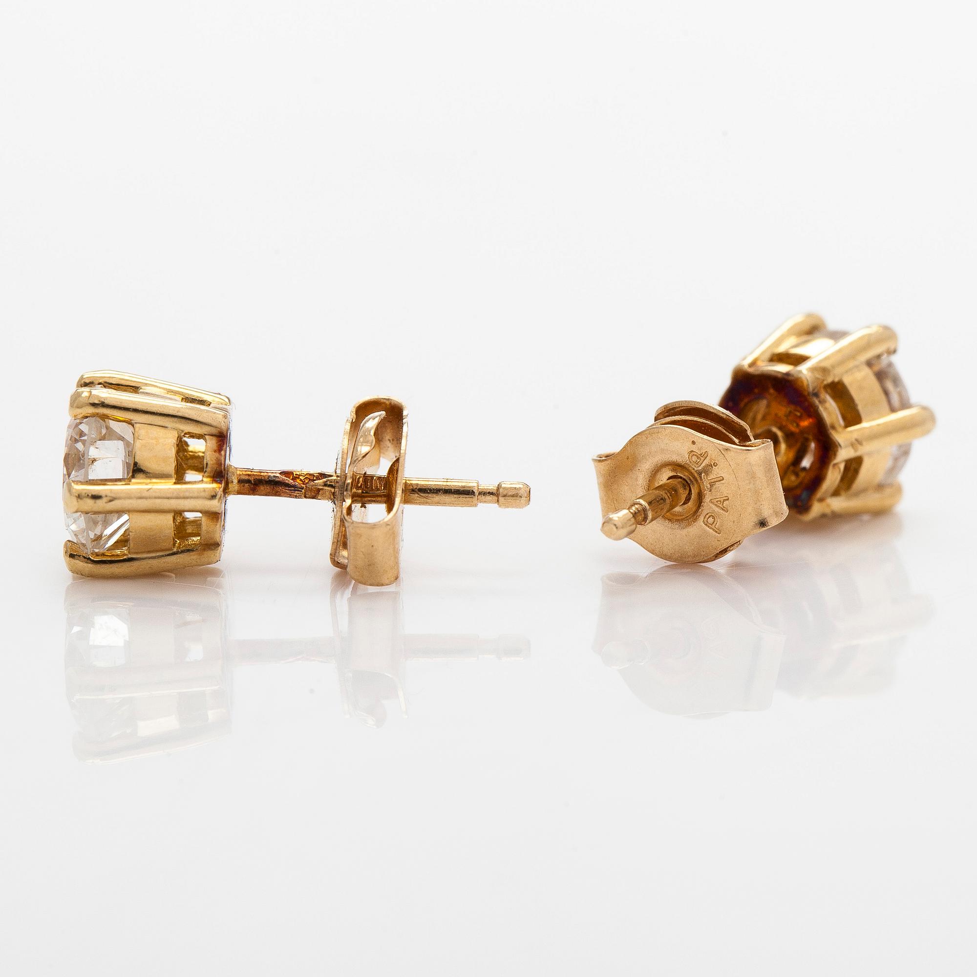A pair of 18K gold earrings, with round brilliant-cut diamonds.
