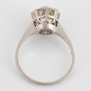 A platinum ring set with an old-cut diamond 3.50 cts according to engraving.