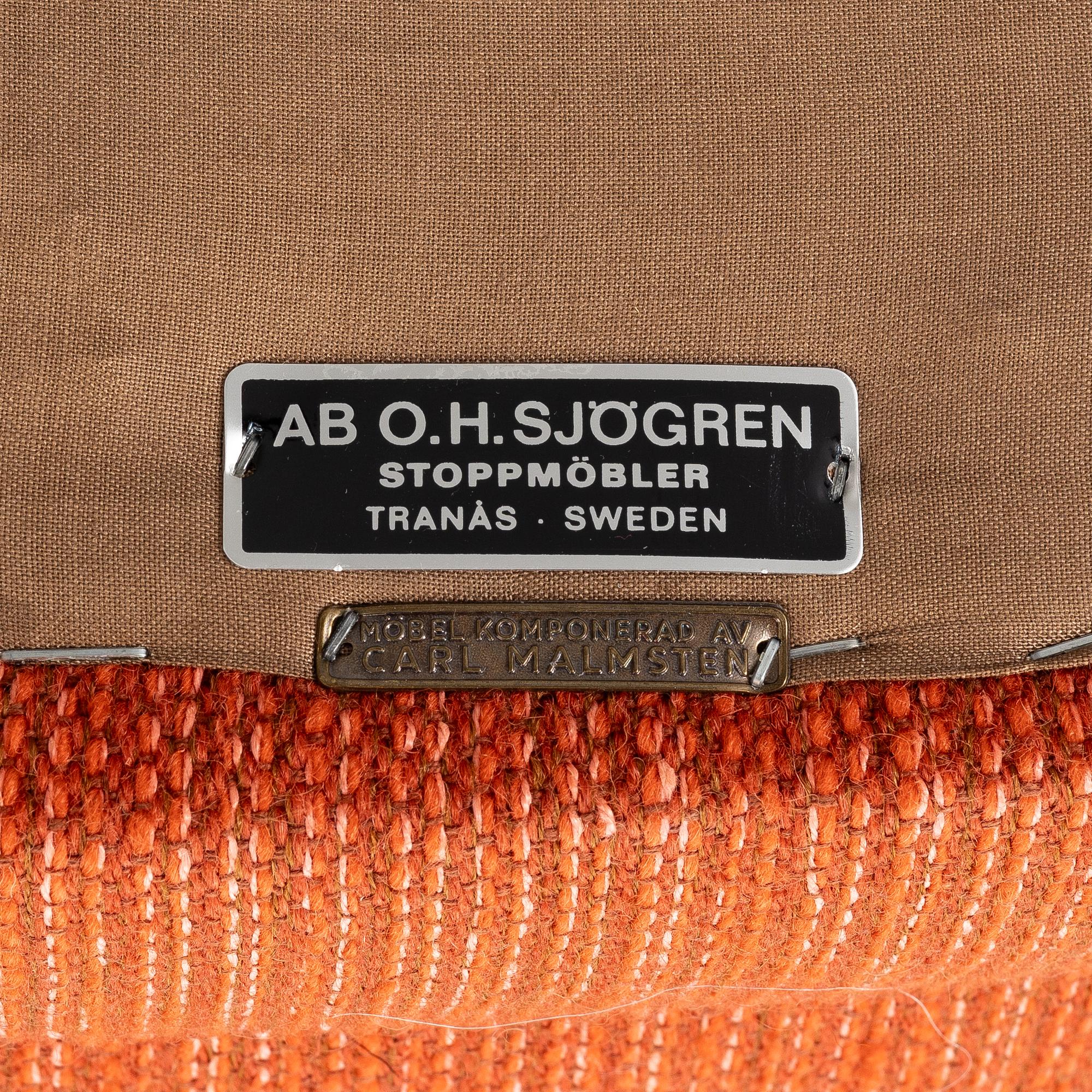 Carl Malmsten, a pair of "Farmor" armchairs, O.H.Sjögren, Sweden, later part of the 20th century.