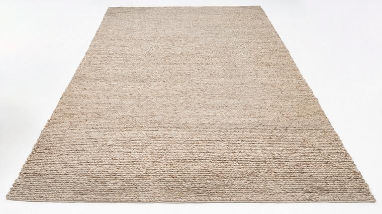 A monochrome carpet, "Chunky wool sand", Lotta Agaton Interiors x Layered, c 400 x 300 cm.